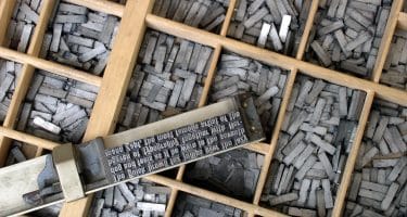 metal movable type - photo by Willi Heidelbach
